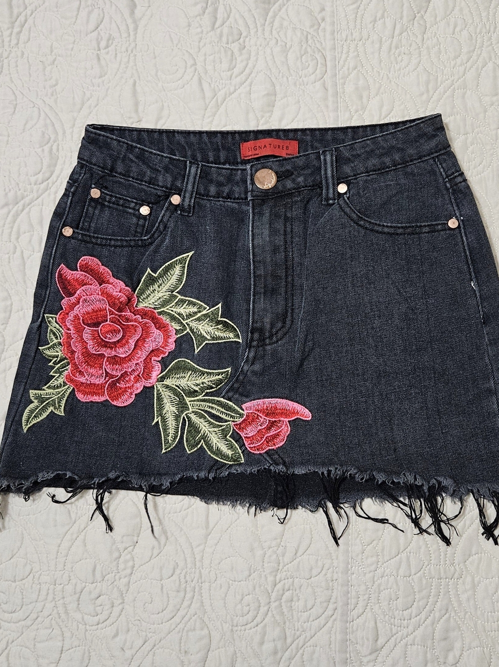 Signature Black Denim Mini Skirt with Pink Floral Embroidery